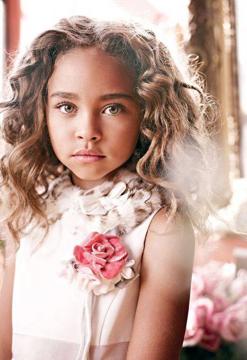 girl with pink rose on dress