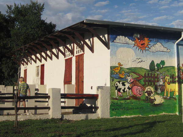 farmyard painting on a white house