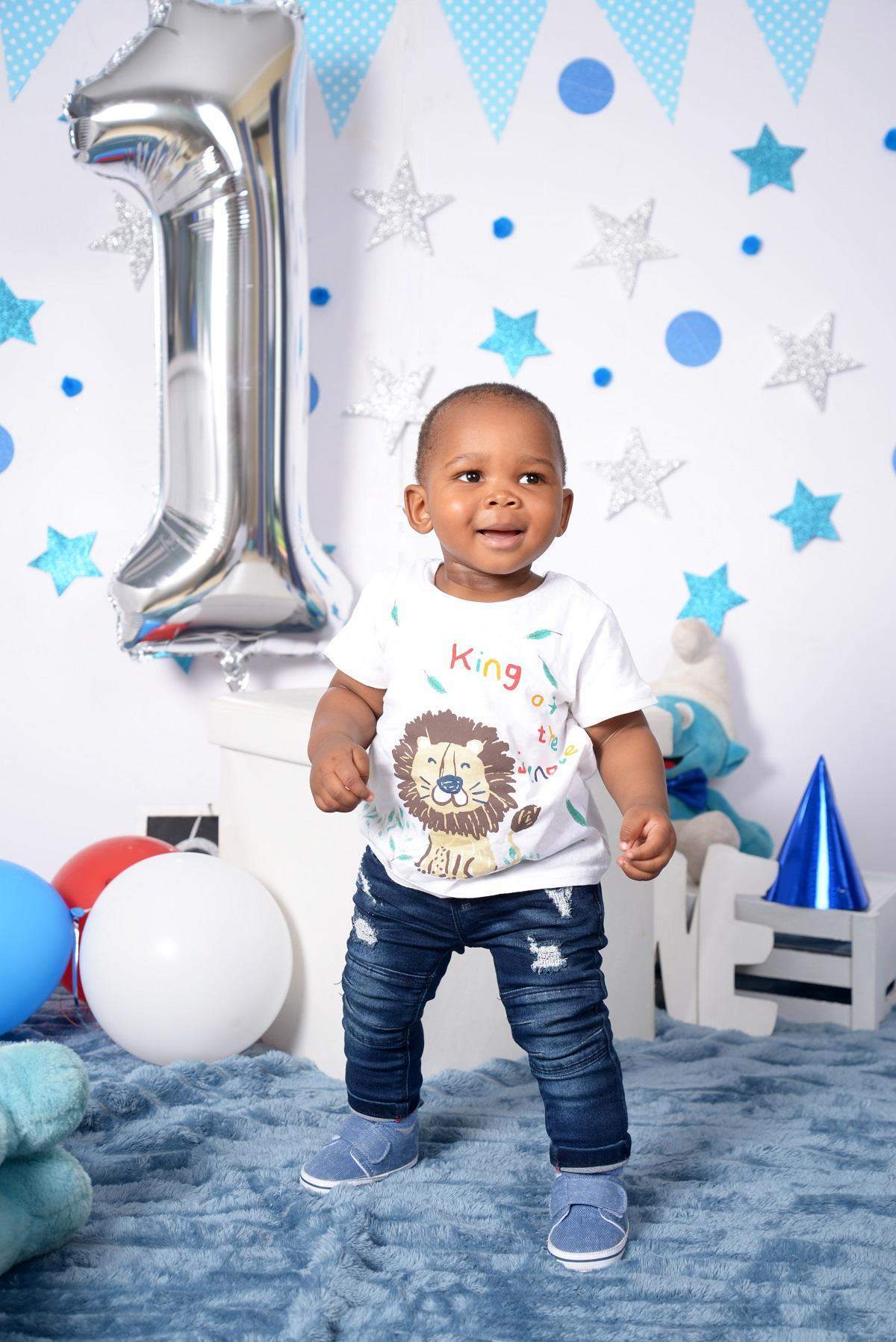 little boy with balloons