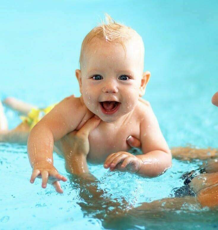 boy with instructor underwater