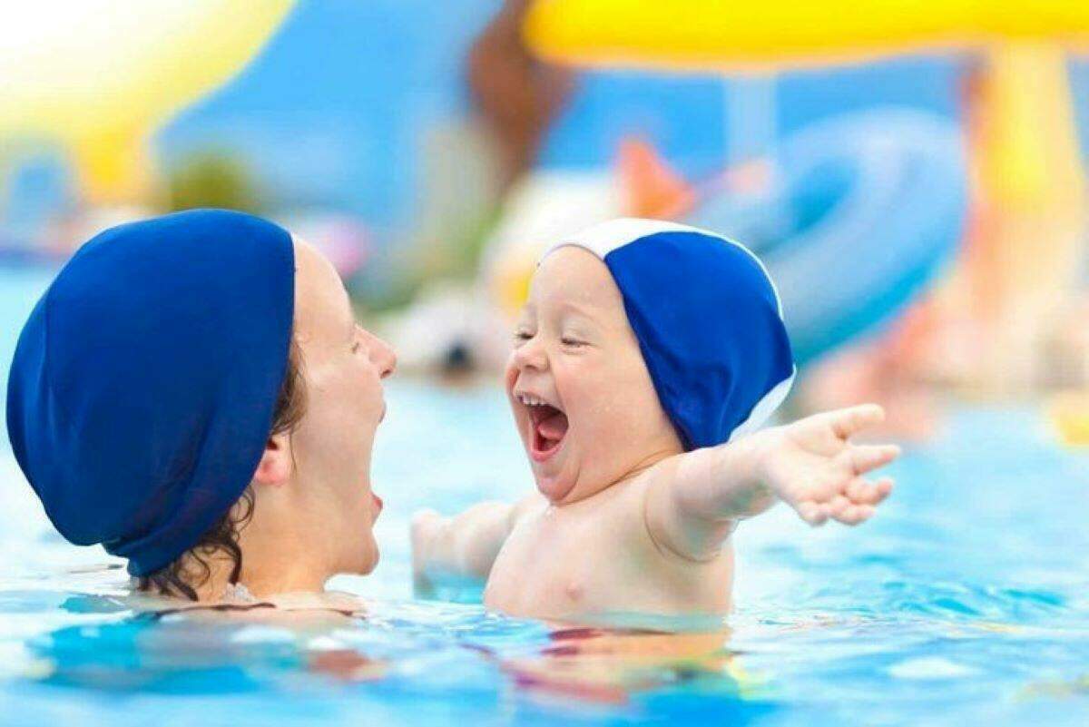 baby learning to swim