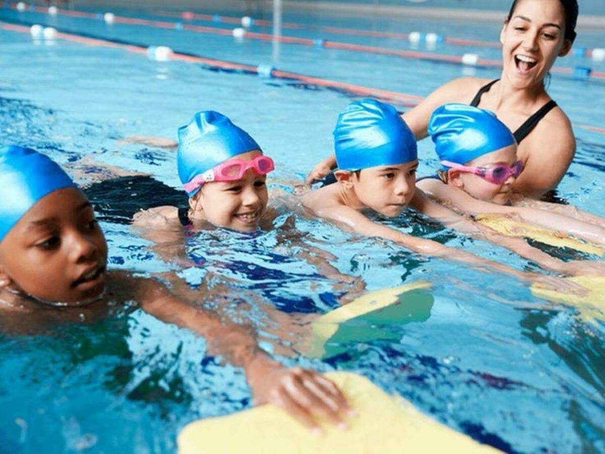 mums with kids in pool