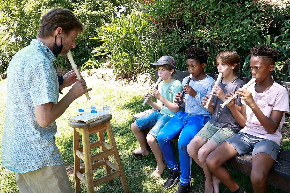 kids learning to play the flute