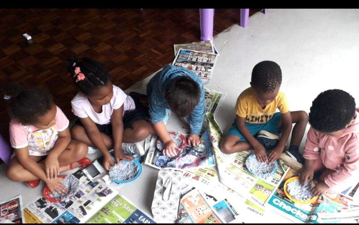 Nursery school room with tables and toys