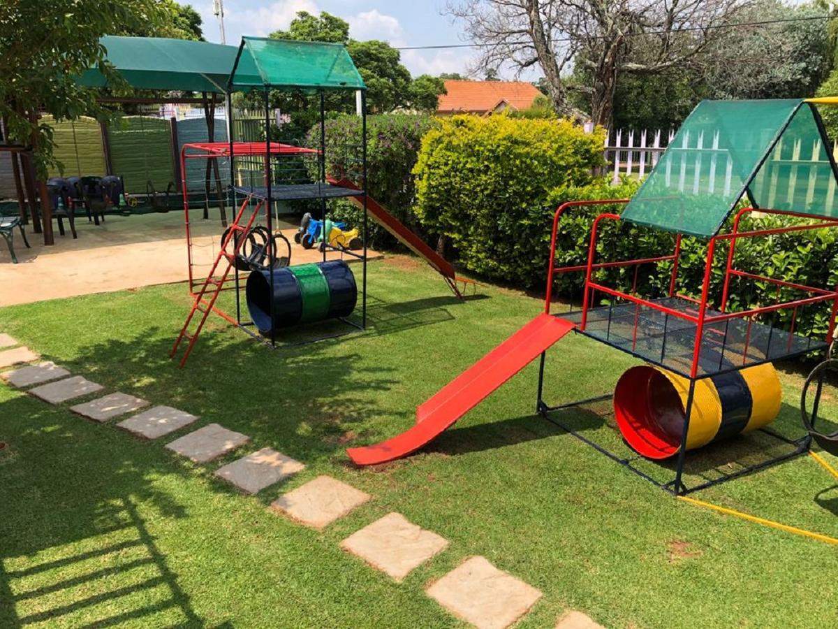 playground with slide and jungle gym